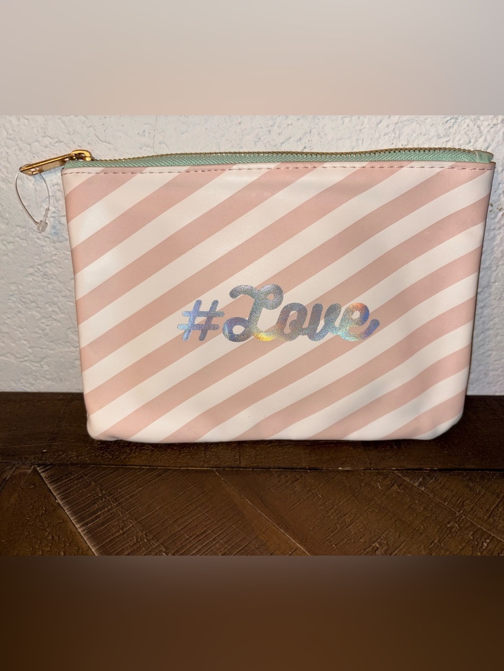 Banila co Women's Pink Striped Cosmetic Pouch with #Love Holographic Accent